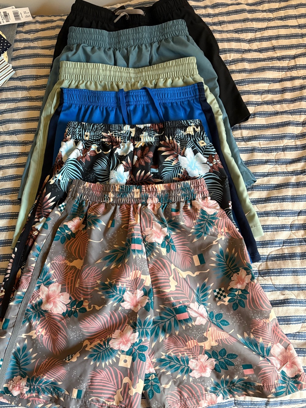 6 pairs of boys shorts. 5 pairs of Nike Shorts and 1 pair of HUK shorts. Large